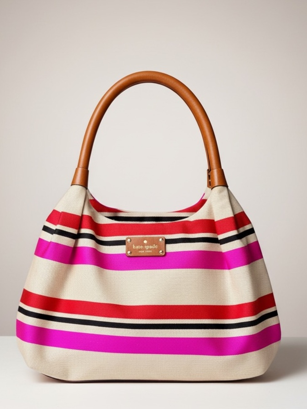 Kate Spade New York Stevie "Oak Island Stripe" Tote Bag in Woven Canvas.
